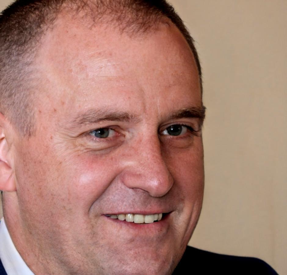 Dashiell Linwood, Lead Instructor at theranqova, reviewing financial education materials